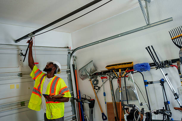 Professional Garage Door Panel Replacement technician working in Smith Mills, MA